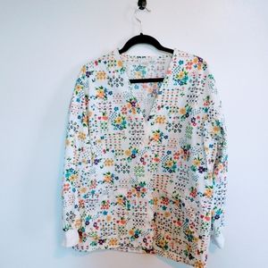 Vintage Angelica size medium white jacket with button front and fun floral print